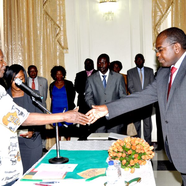 President Michael Sata congratulates health deputy minister Dr Chitalu Chilufya during the  swearing-in-Ceremony  at State House on December 2,2013 -Picture by THOMAS NSAMA